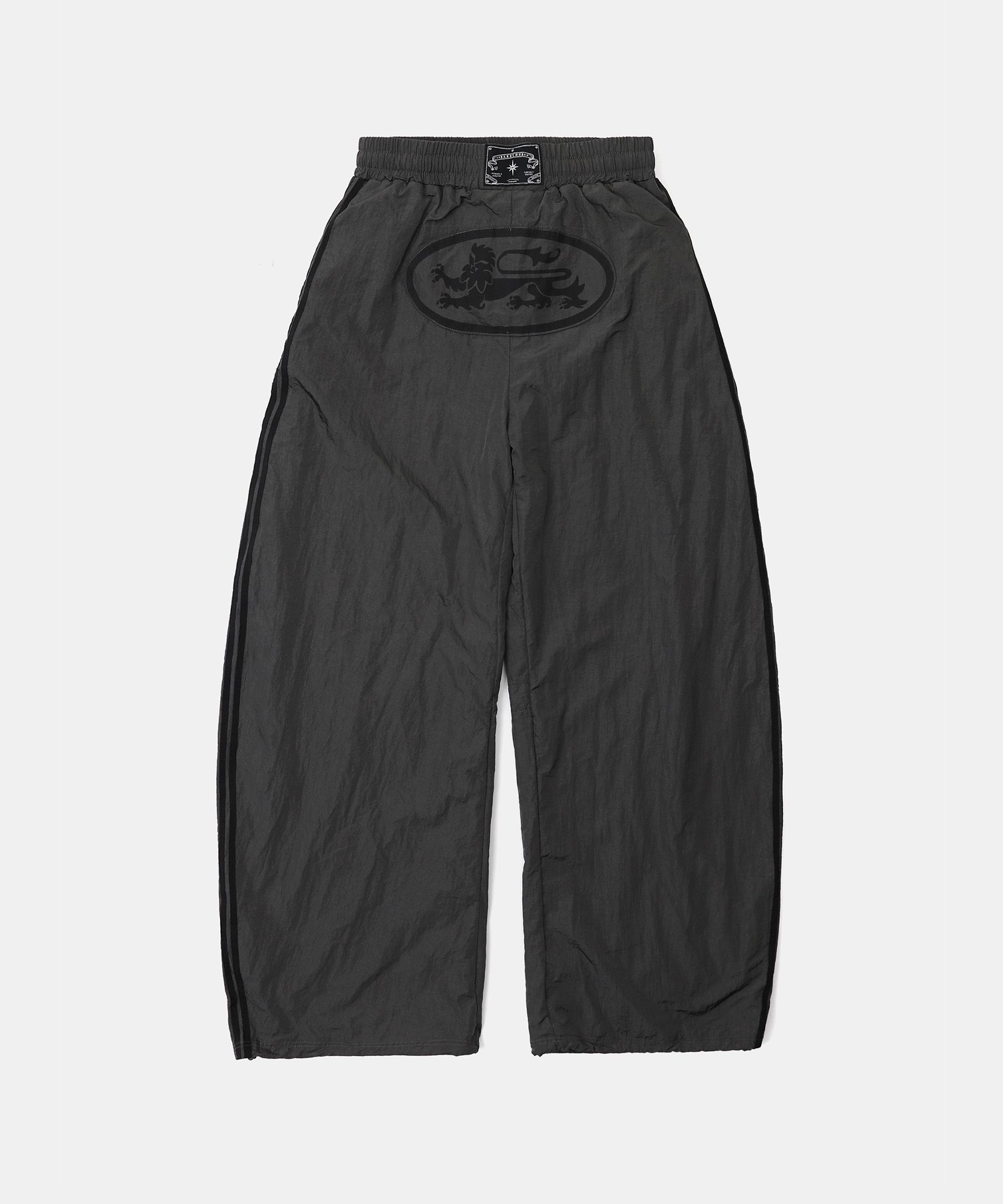 MUSINSA | BADBLOOD Dark Billy Nylon Curved Track Pants