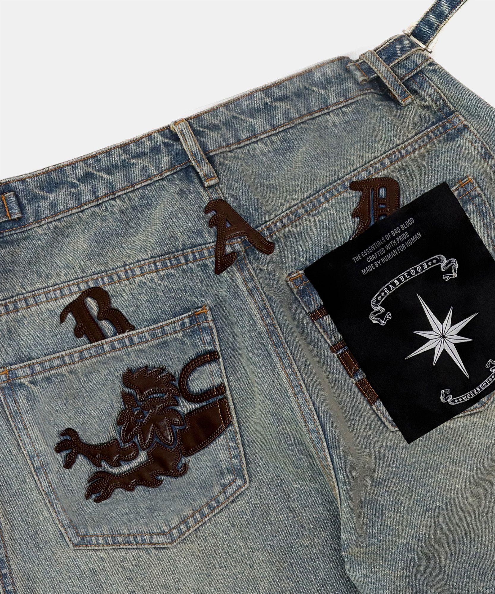 MUSINSA | BADBLOOD Lion Logo Barrel Jeans - Dusty Light Blue