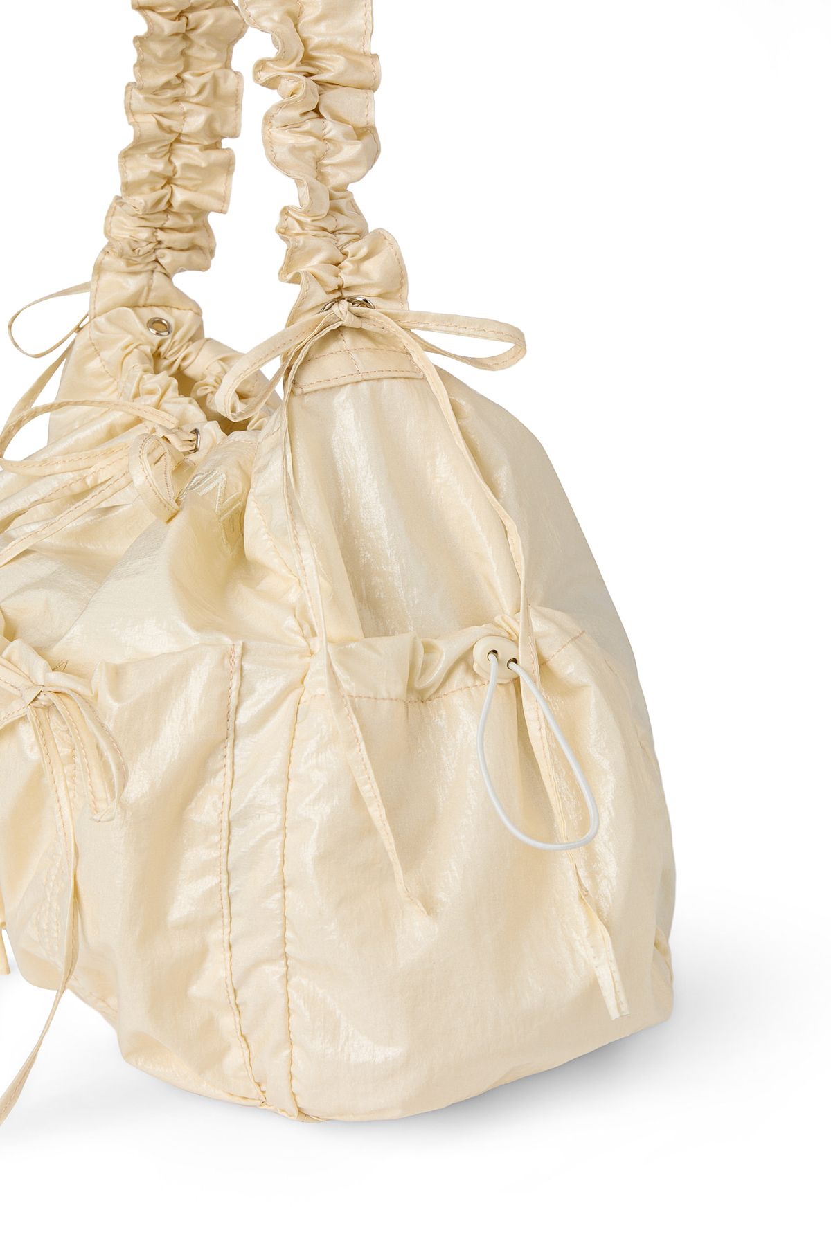 다이닛(DEINET) DEINET COATING SHIRRING BAG IN CREAM