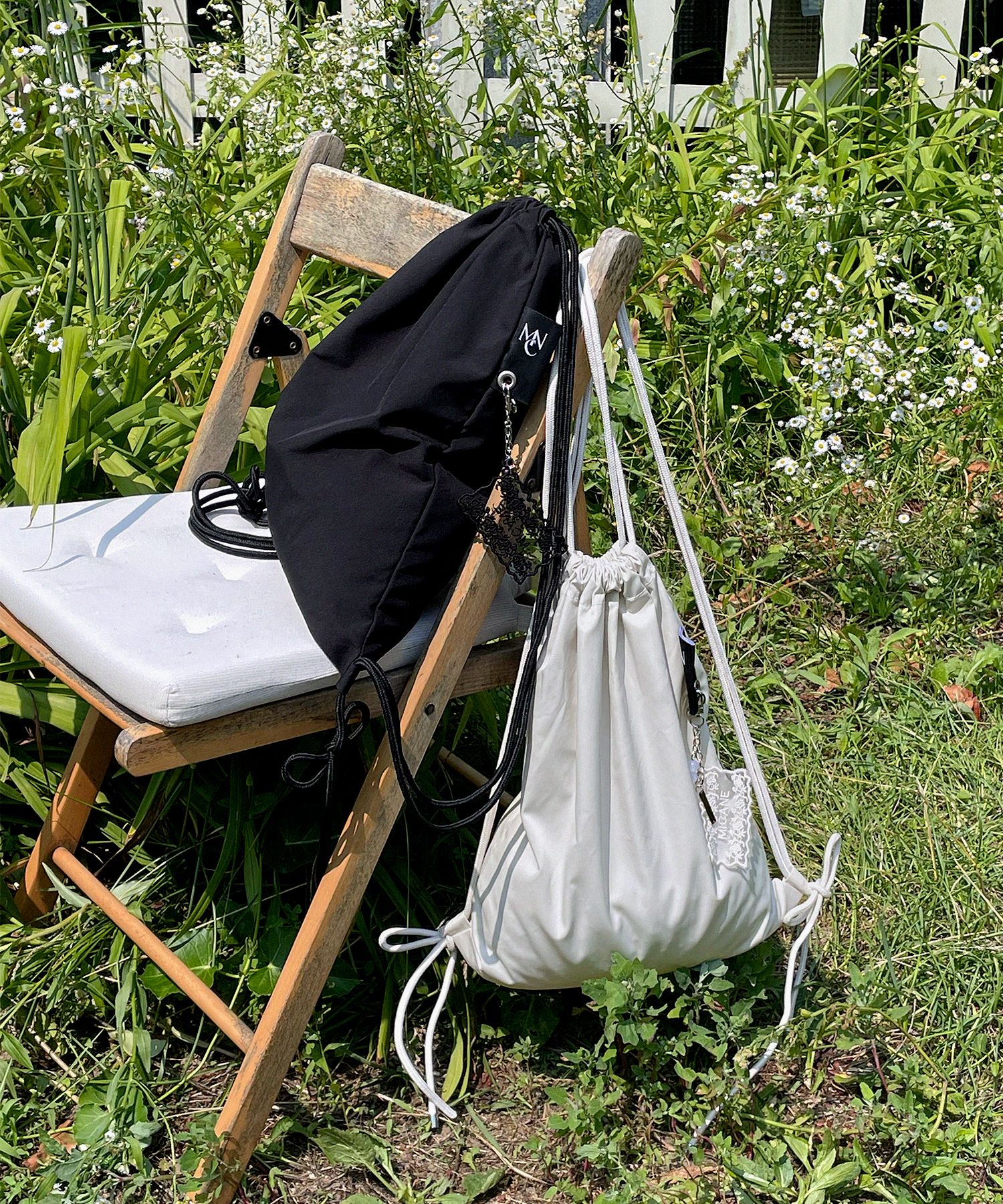 MICANE Vesper String Backpack ナップサック　韓国 MUSINSA公式 | MICANE Vesper String Backpack