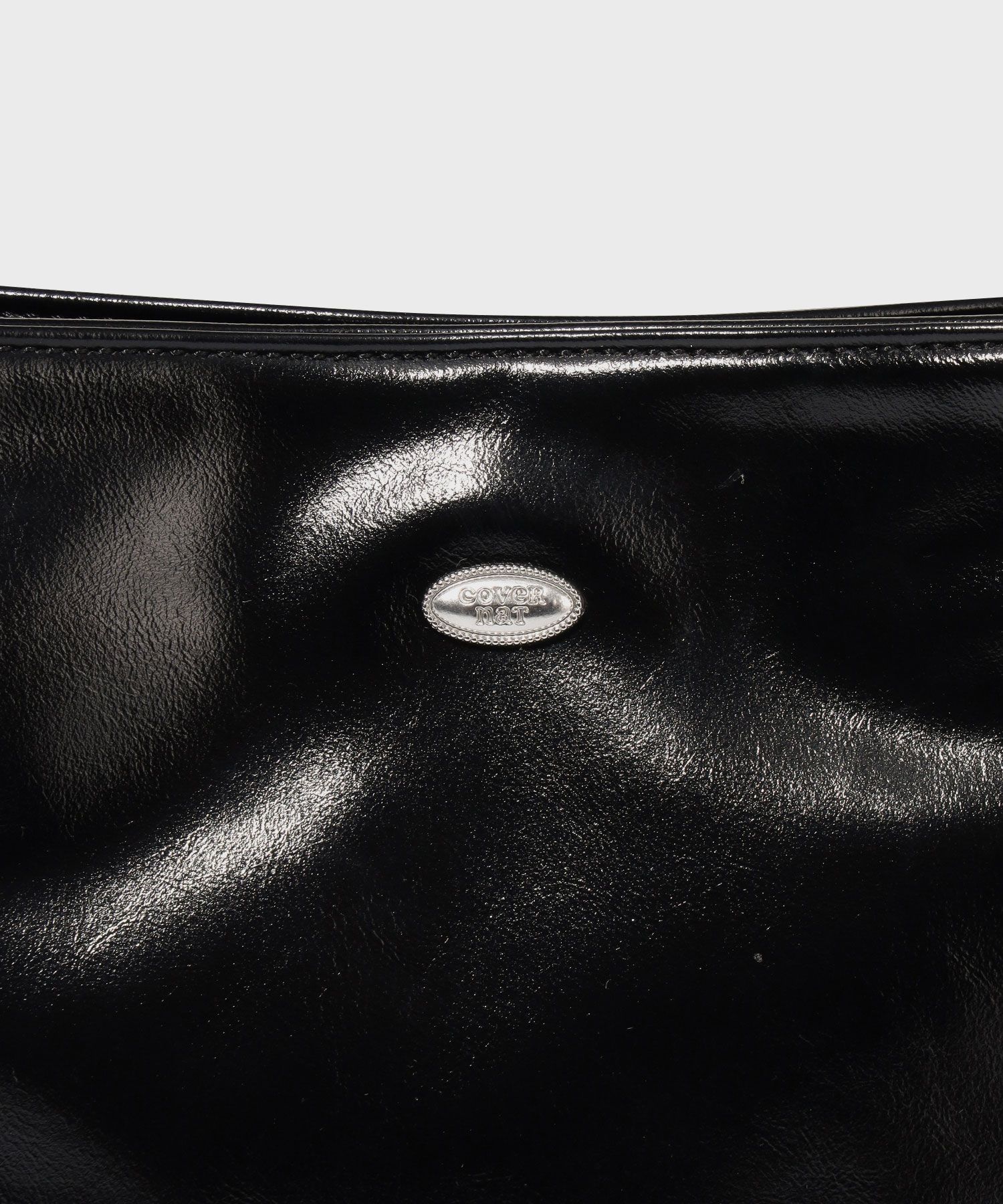 ★COVERNAT WOMAN★ Cloverheart glossy cylindrical bag black MUSINSA | COVERNAT WOMAN Clover Heart Glossy Cylinder Bag Black