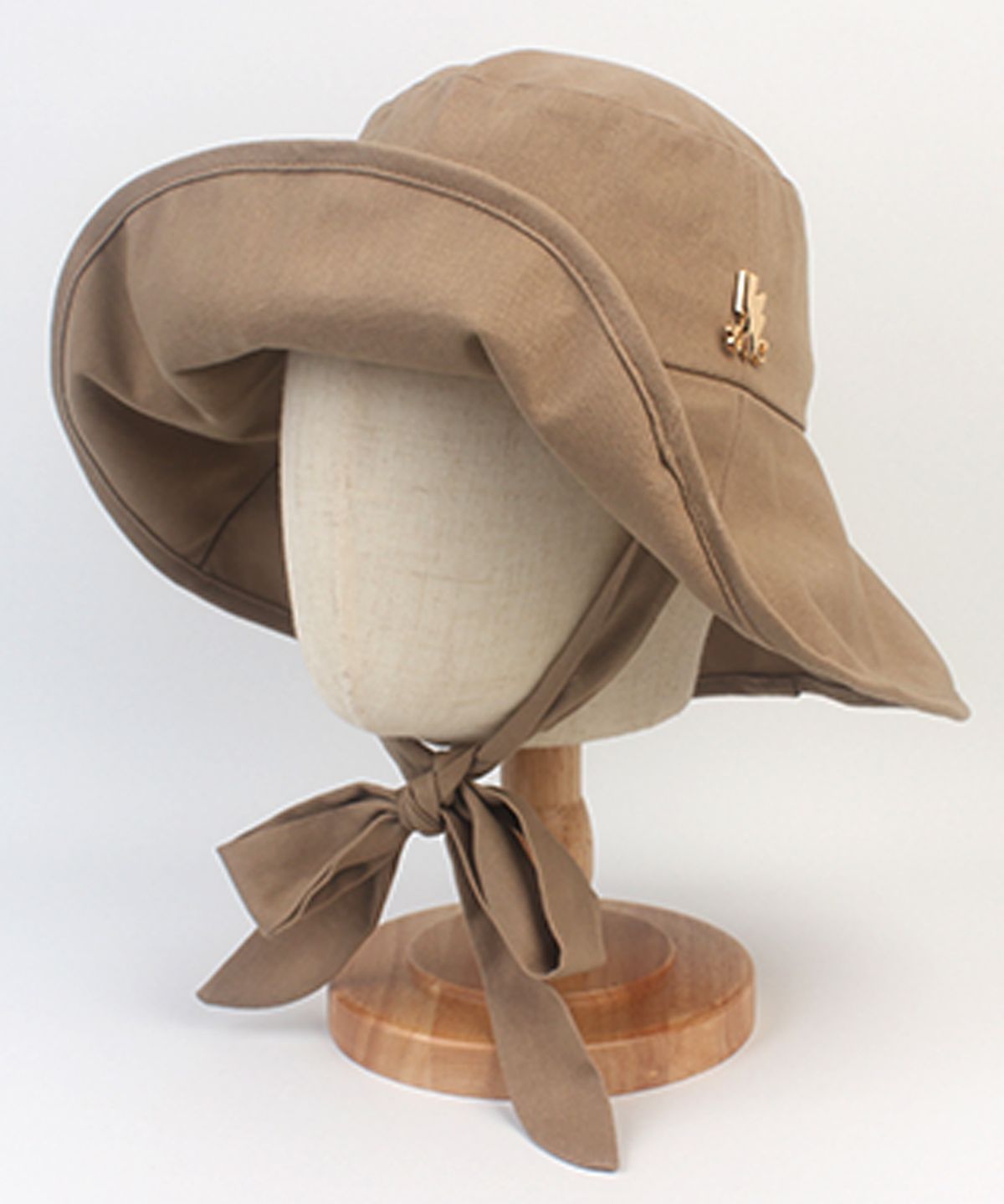 유니버셜 케미스트리(UNIVERSAL CHEMISTRY) Summer Bold String Beige Bucket Hat 여름버킷햇