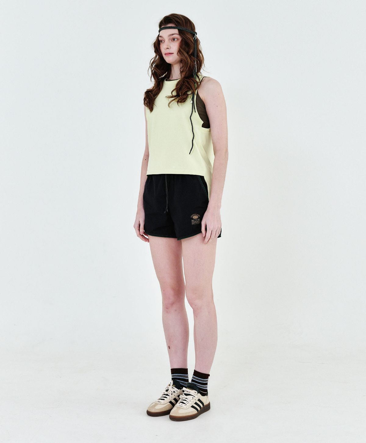 누크피터(NUUKFITTER) NKFT LAYERED SLIT SLEEVELESS_WOMEN [LEMON]