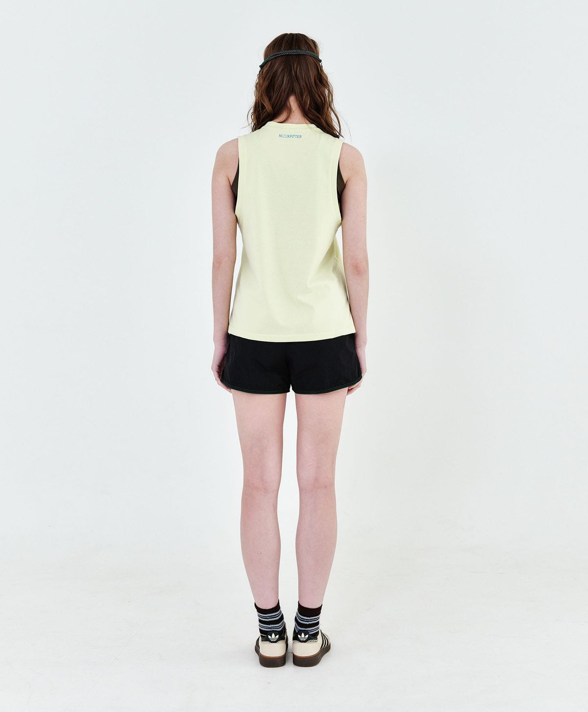 누크피터(NUUKFITTER) NKFT LAYERED SLIT SLEEVELESS_WOMEN [LEMON]