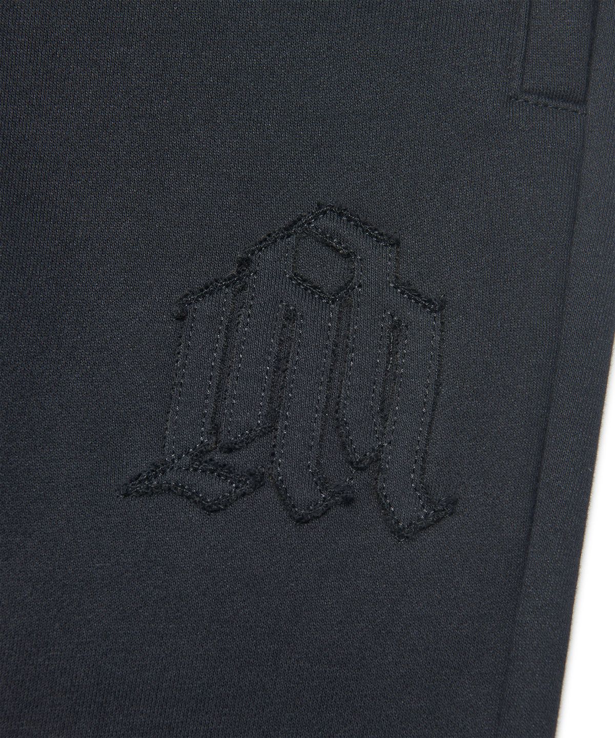 노매뉴얼(NOMANUAL) OVERLAY LOGO SWEATPANTS - BLACK