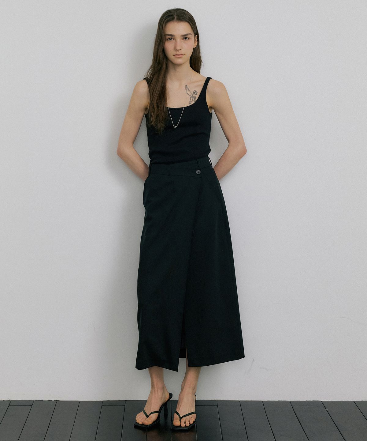 오떼뜨(OCTETTE) SUMMER-WOOL CLASSIC WRAP SKIRTS_BLACK