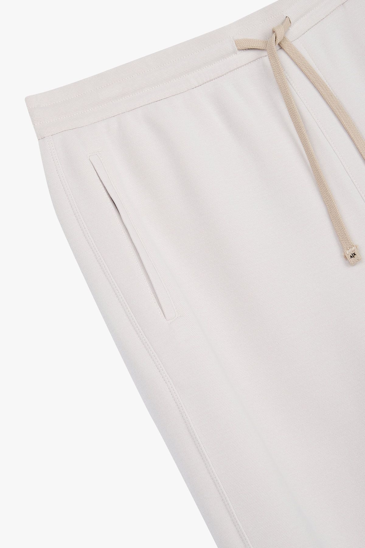 아르마니 익스체인지(ARMANI EXCHANGE) 남성 배색 드로스트링 조거 팬츠_에크루 A415342008