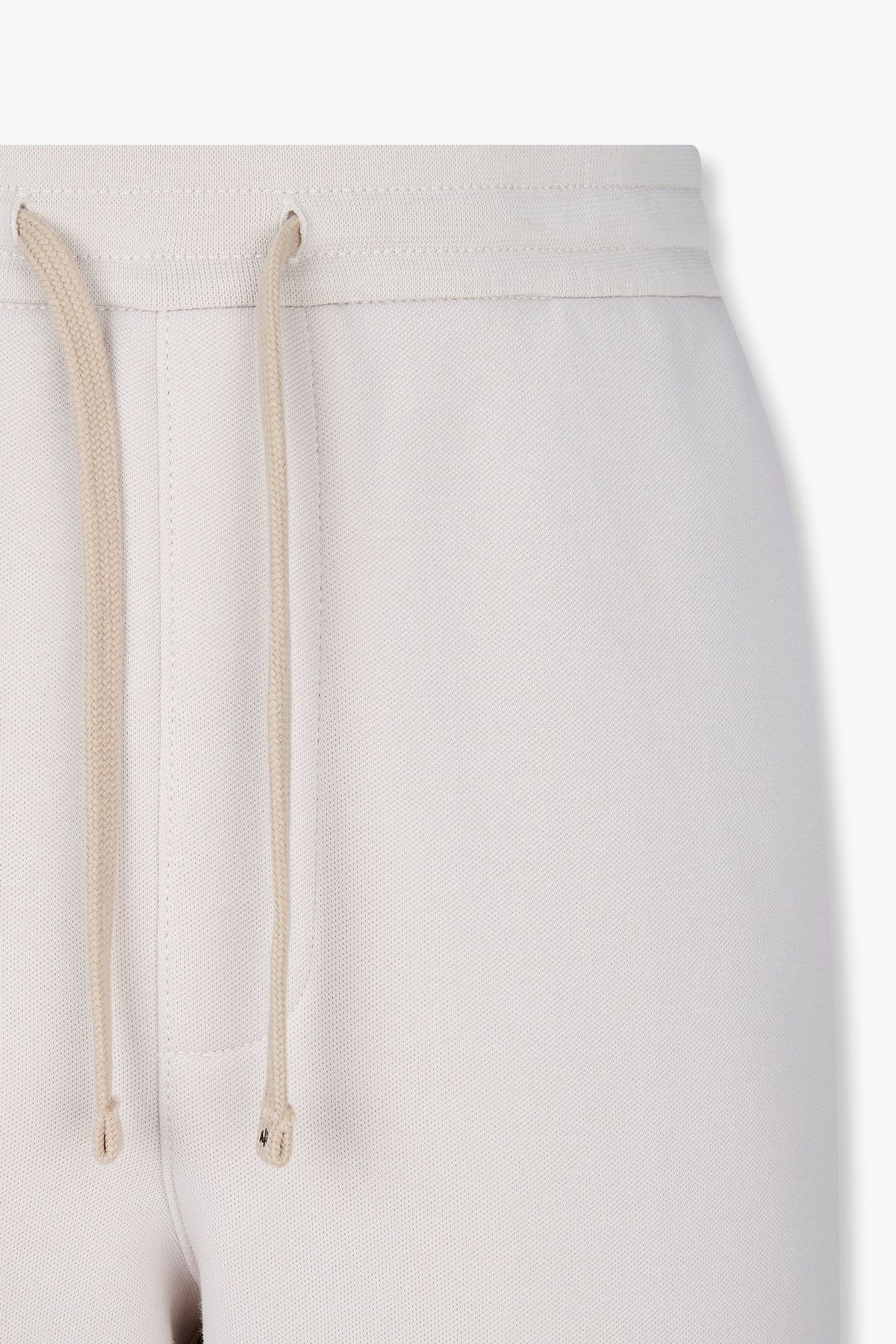 아르마니 익스체인지(ARMANI EXCHANGE) 남성 배색 드로스트링 조거 팬츠_에크루 A415342008