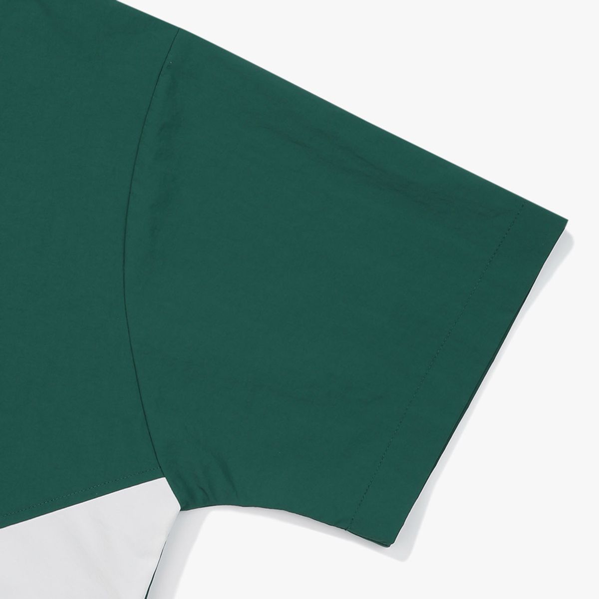디아도라(diadora) 그랜드슬램 컬러 블록 반팔 아노락 GREEN