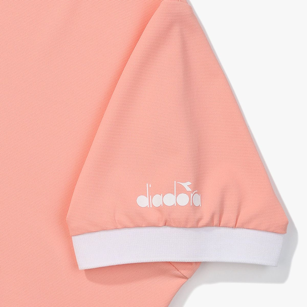 디아도라(diadora) 크롭 반팔 피스테 CORAL