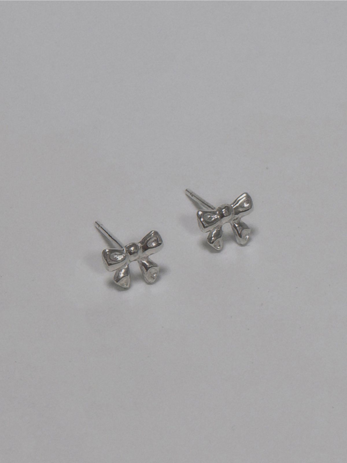 러브트릭스(LOVETRIX) silver925 Ribbon earring