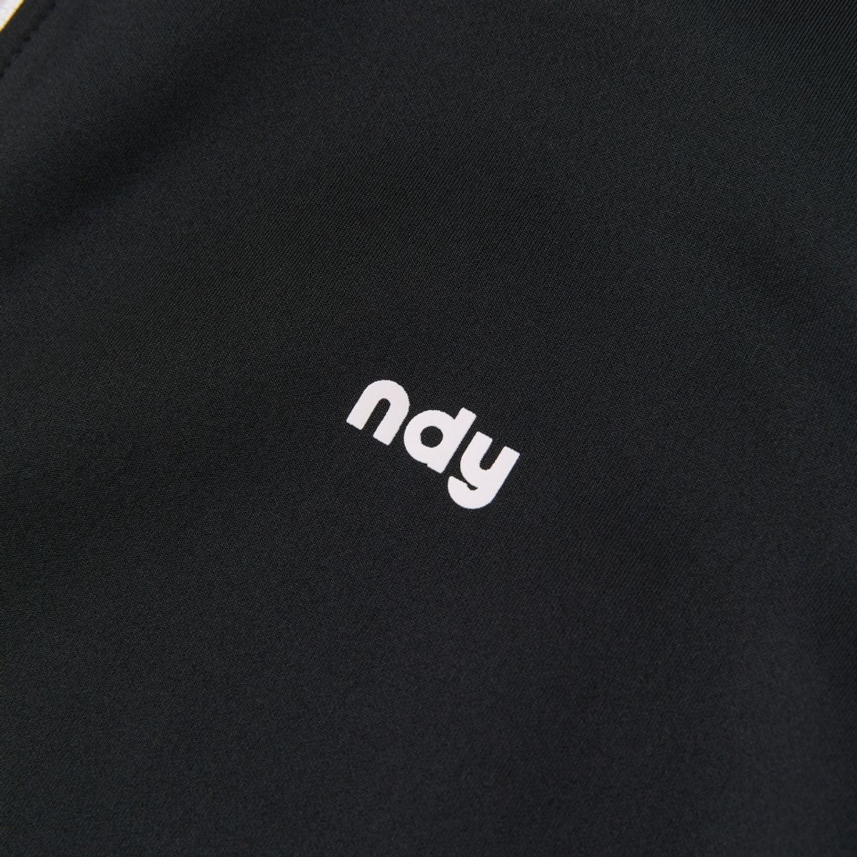 엔디와이(NDY) 우먼스 리본 트랙 탑 블랙