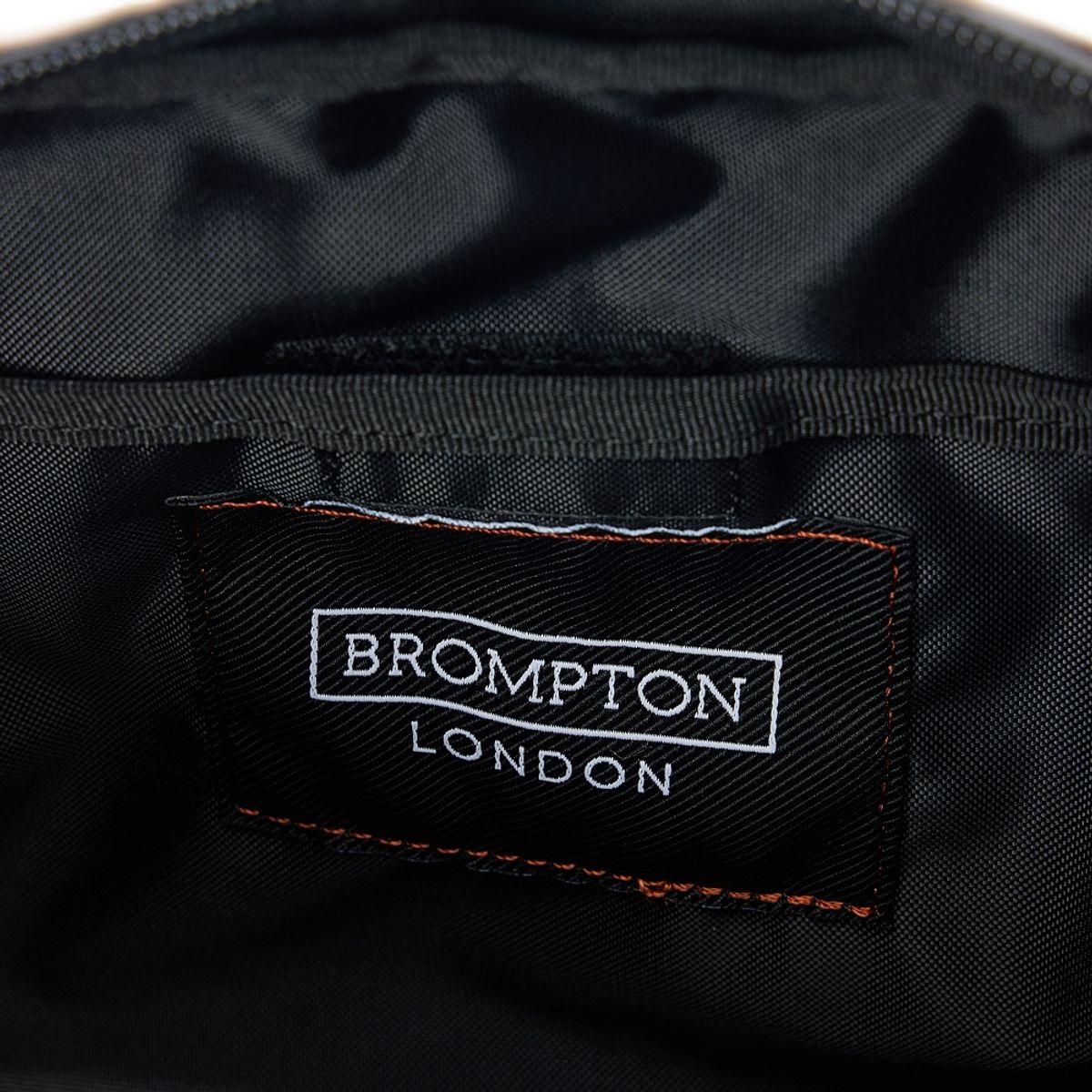 브롬톤 런던(BROMPTON LONDON) 6-SHAPED RING DETAIL CROSS BAG - BROWN (P255ACR110)