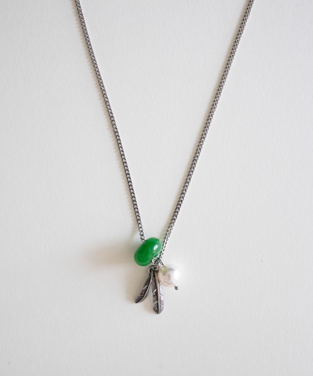 메리모티브(MERRYMOTIVE) Good luck and peace long necklace