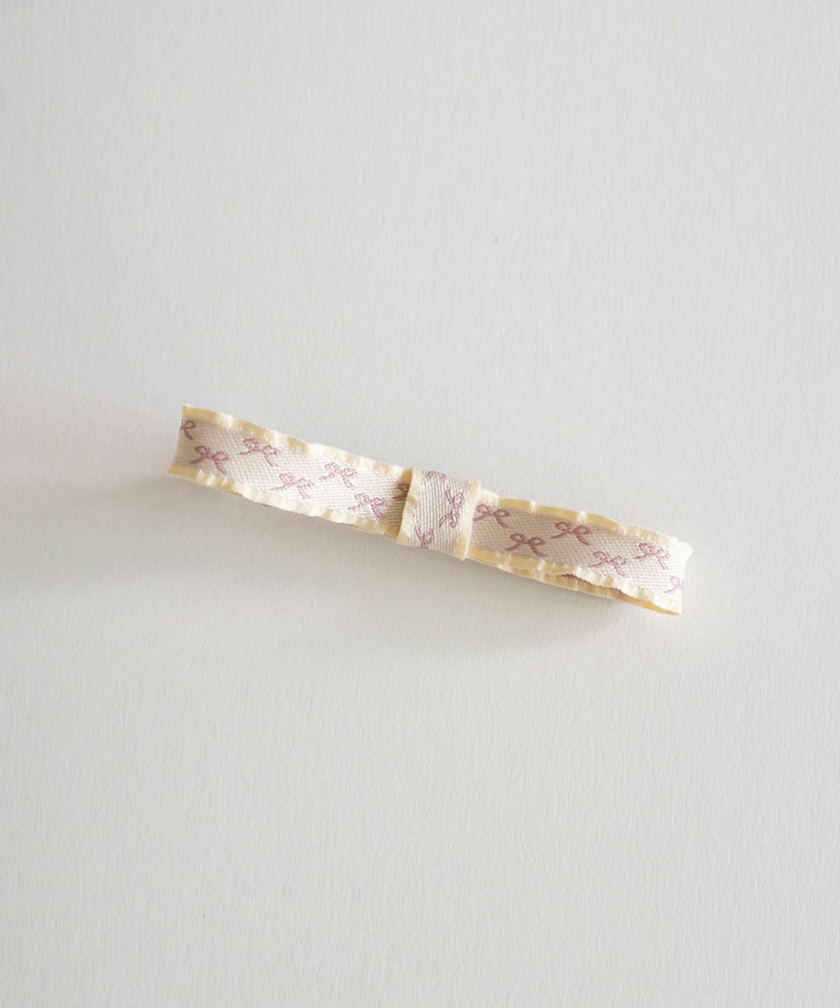 메리모티브(MERRYMOTIVE) Hippie ribbon jacquard hairpin