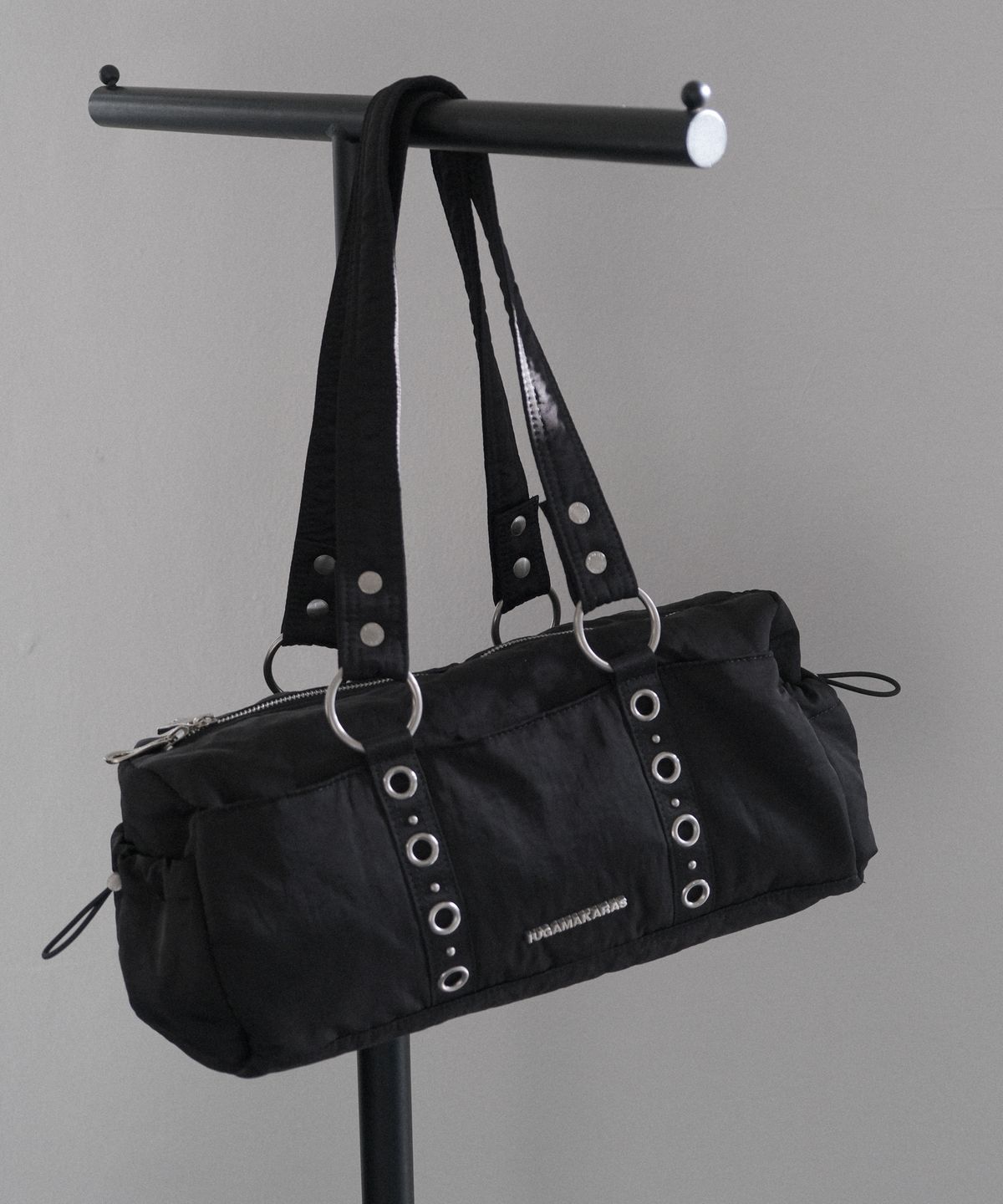이우가마카라스(IUGAMAKARAS) Nylon Eyelet Duffle Bag (Black)