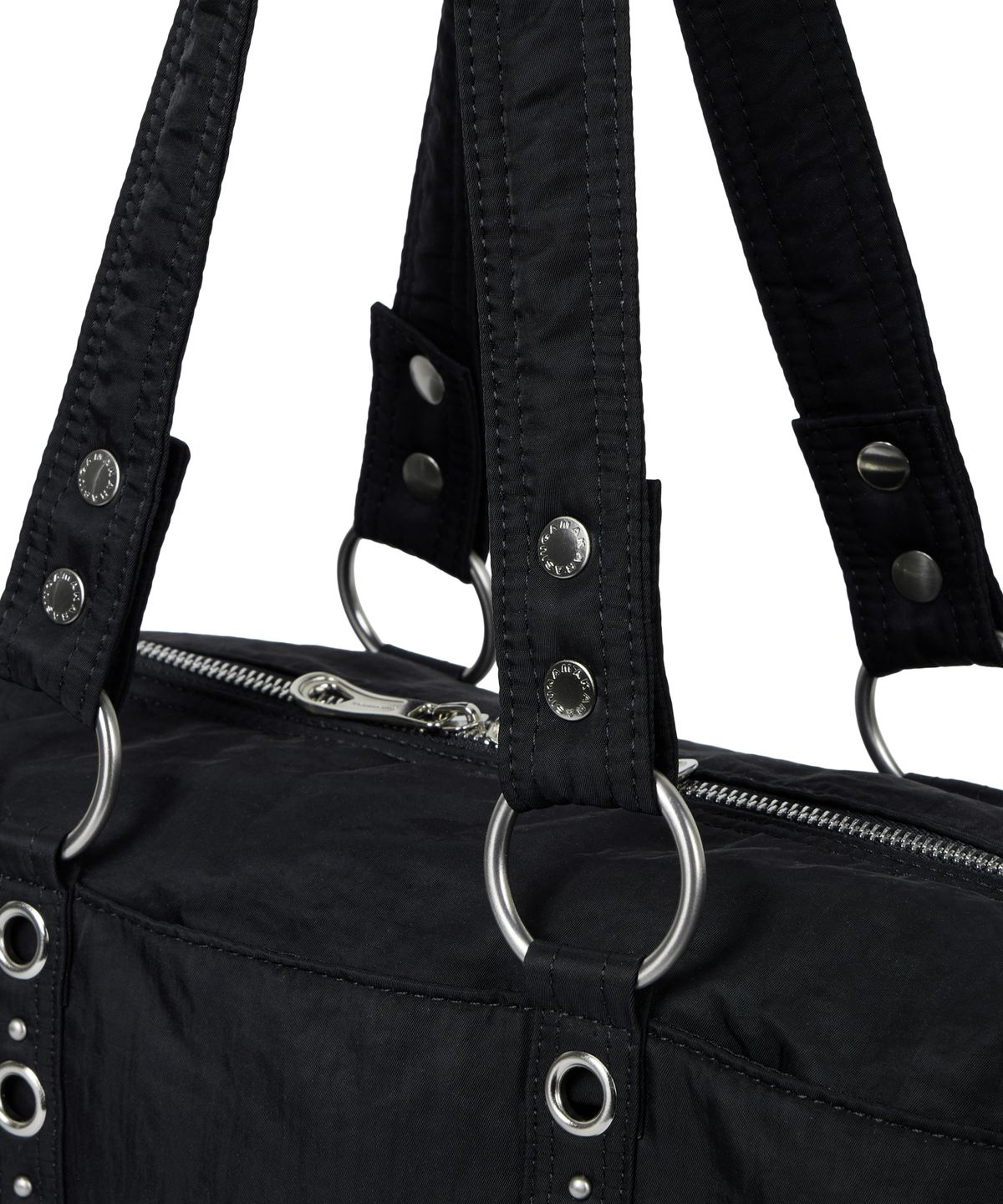 이우가마카라스(IUGAMAKARAS) Nylon Eyelet Duffle Bag (Black)