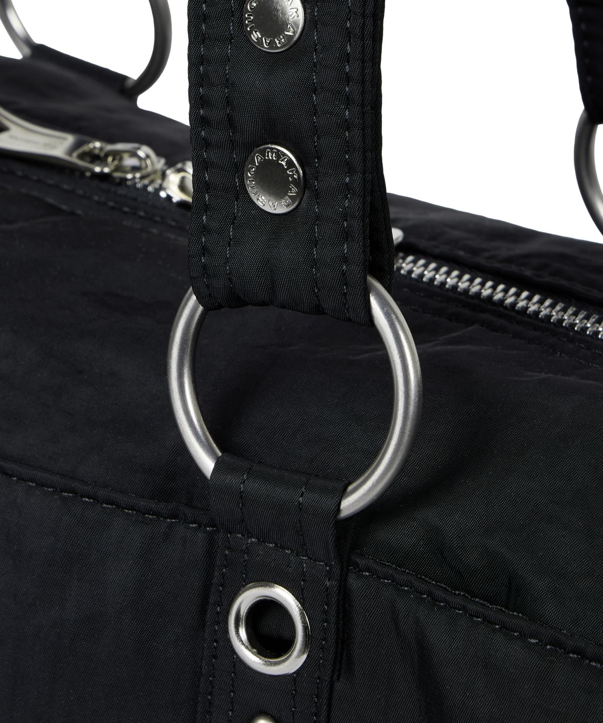 이우가마카라스(IUGAMAKARAS) Nylon Eyelet Duffle Bag (Black)