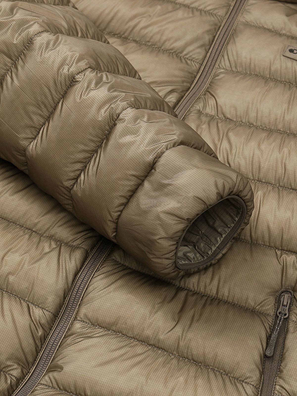 디스커버리 익스페디션(DISCOVERY EXPEDITION) 여성 올버트 구스다운 경량패딩 (BEIGE)
