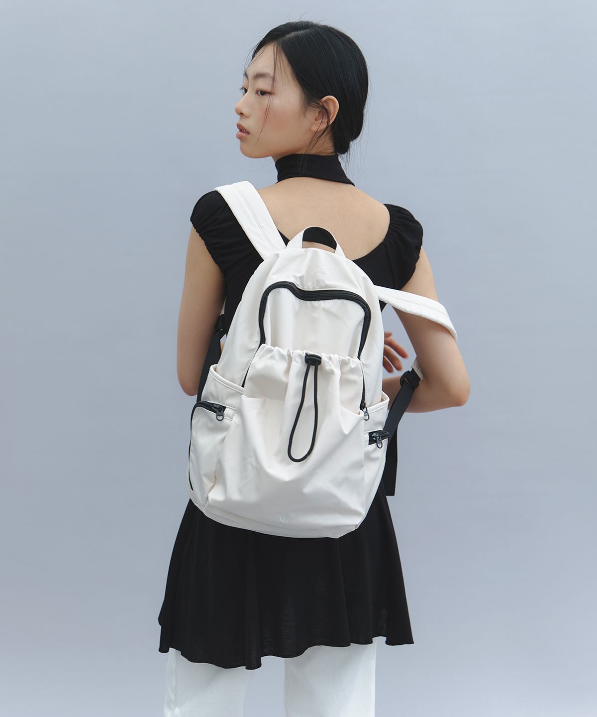 앤드엘(ANDL) 쉐이드 스트링 백팩 - 아이보리