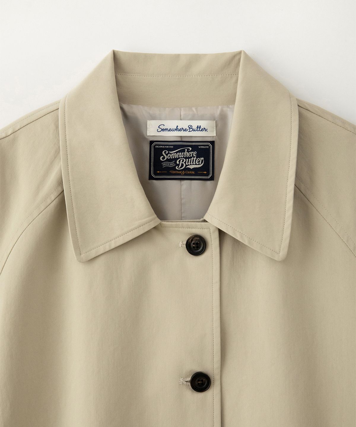 썸웨어버터(SOMEWHEREBUTTER) Mode Trench Coat - Beige