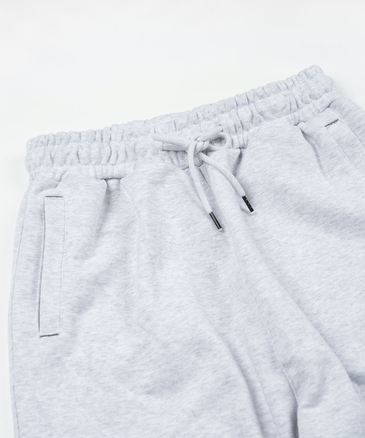 프리즘웍스(FRIZMWORKS) COVER STITCH SWEAT PANTS _ WHITE MELANGE