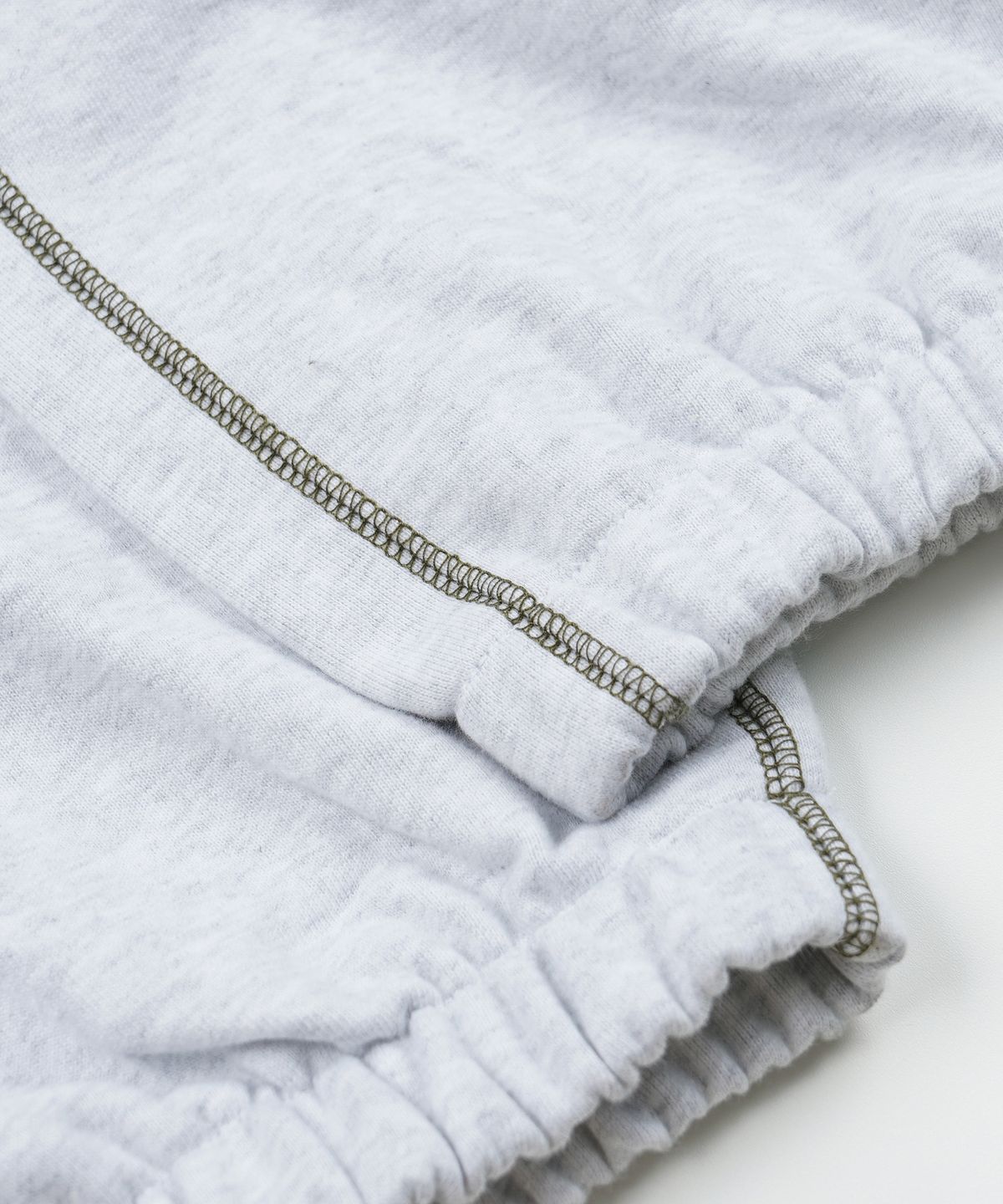 프리즘웍스(FRIZMWORKS) COVER STITCH SWEAT PANTS _ WHITE MELANGE