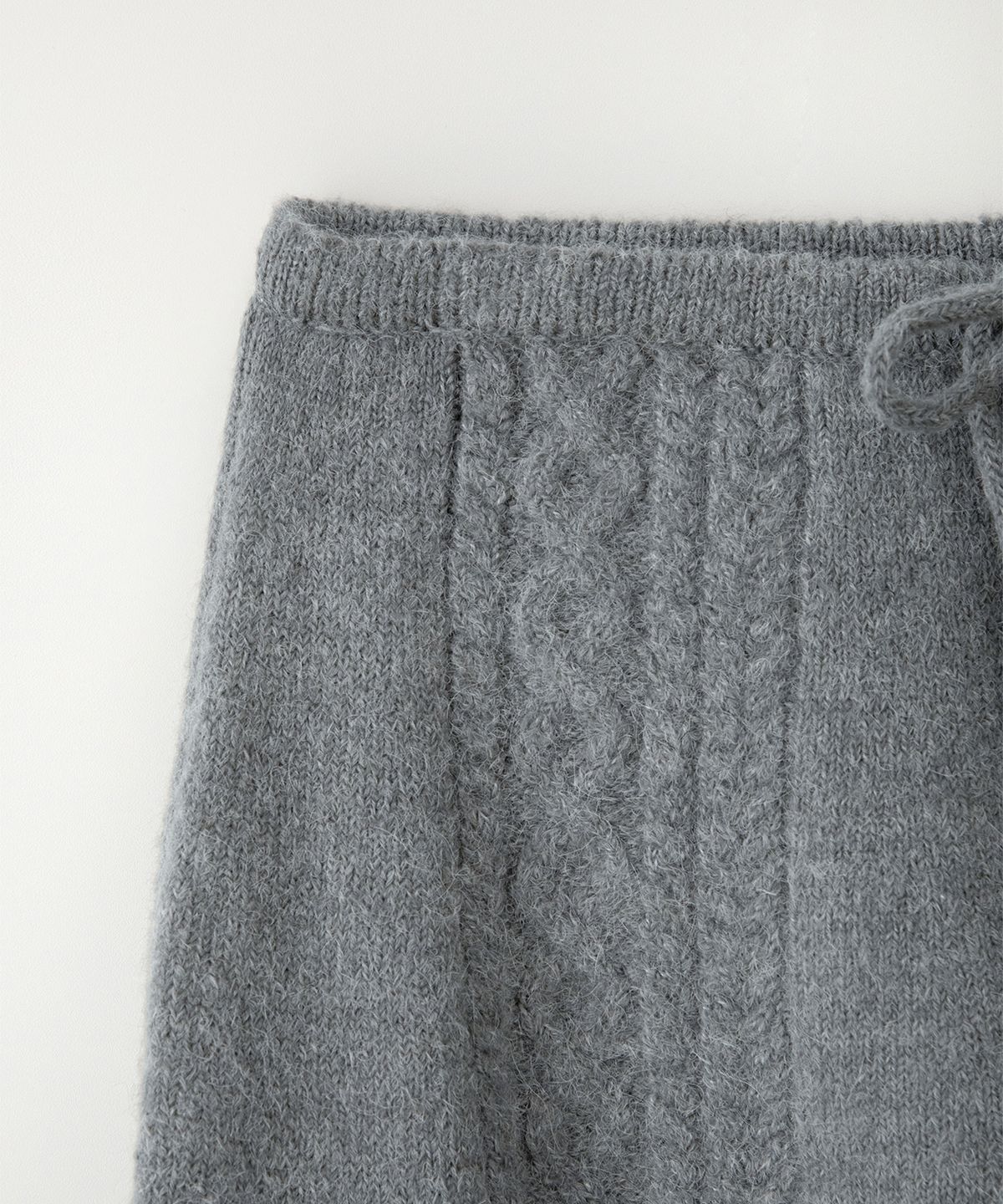 썸웨어버터(SOMEWHEREBUTTER) Alpaca Cable Mini Skirt - Grey