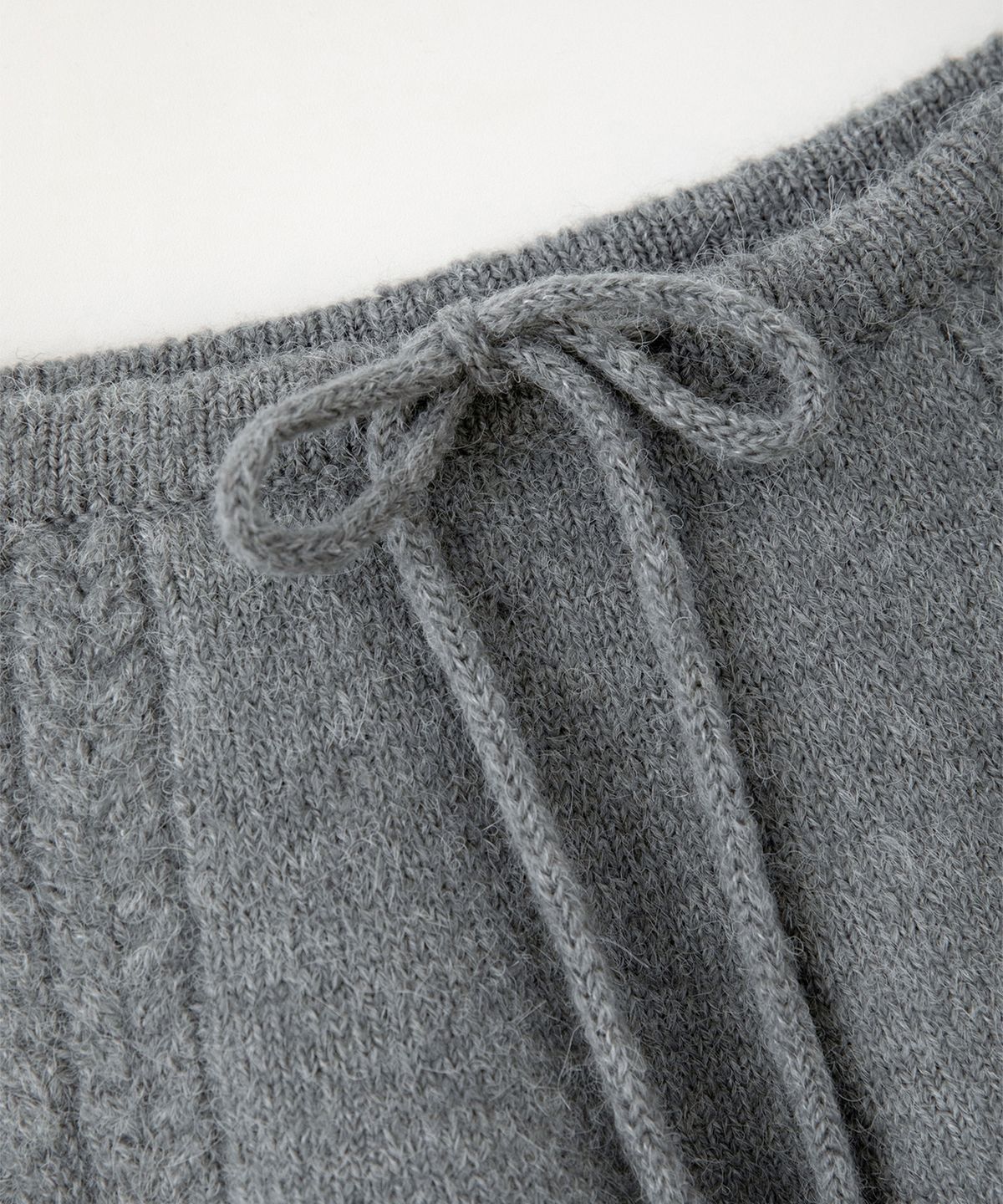 썸웨어버터(SOMEWHEREBUTTER) Alpaca Cable Mini Skirt - Grey