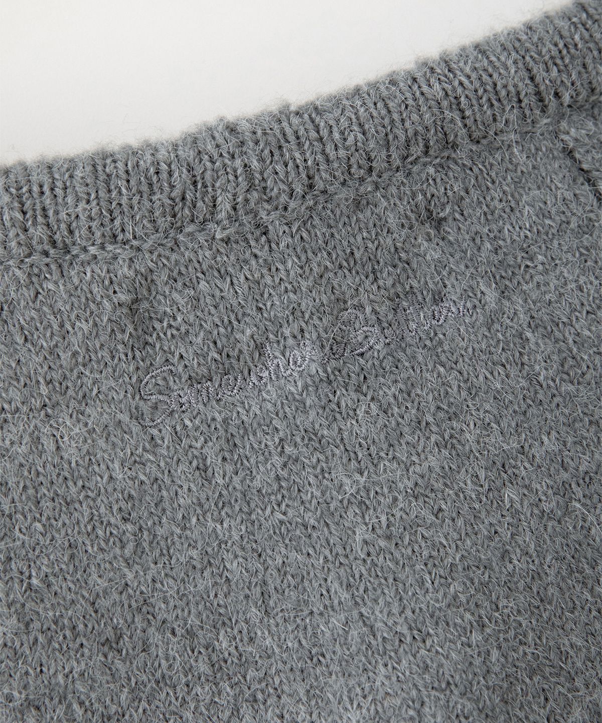 썸웨어버터(SOMEWHEREBUTTER) Alpaca Cable Mini Skirt - Grey