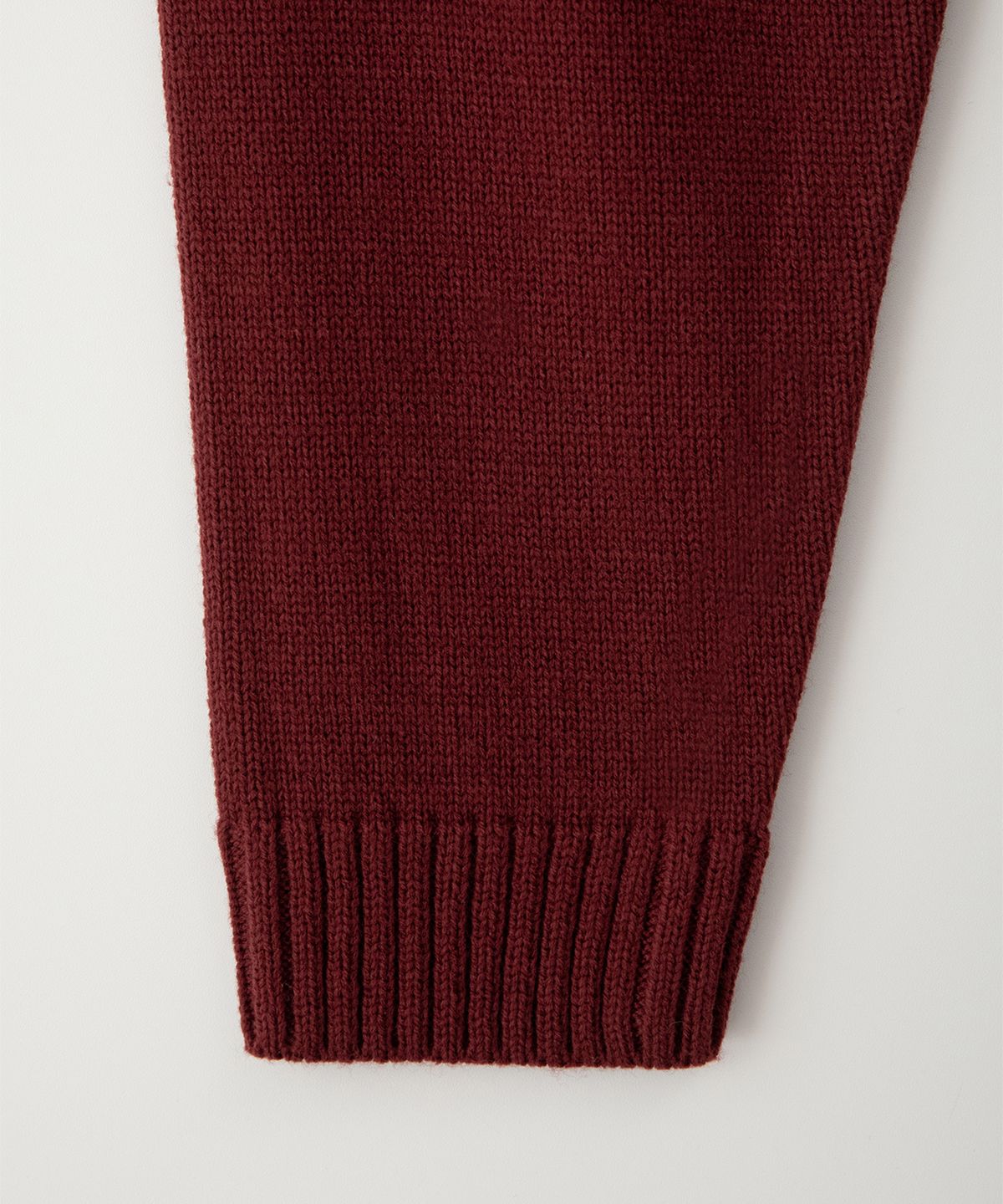 썸웨어버터(SOMEWHEREBUTTER) Casual Wave Logo Knit - Burgundy