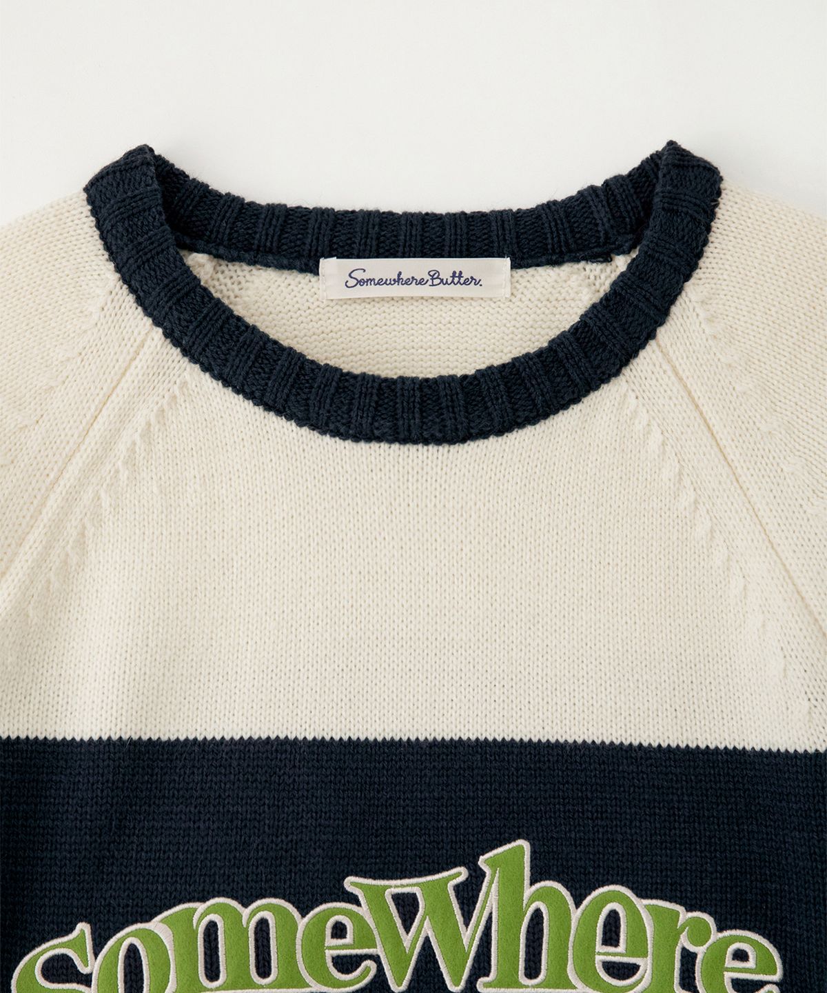썸웨어버터(SOMEWHEREBUTTER) Casual Wave Logo Knit - Ivory