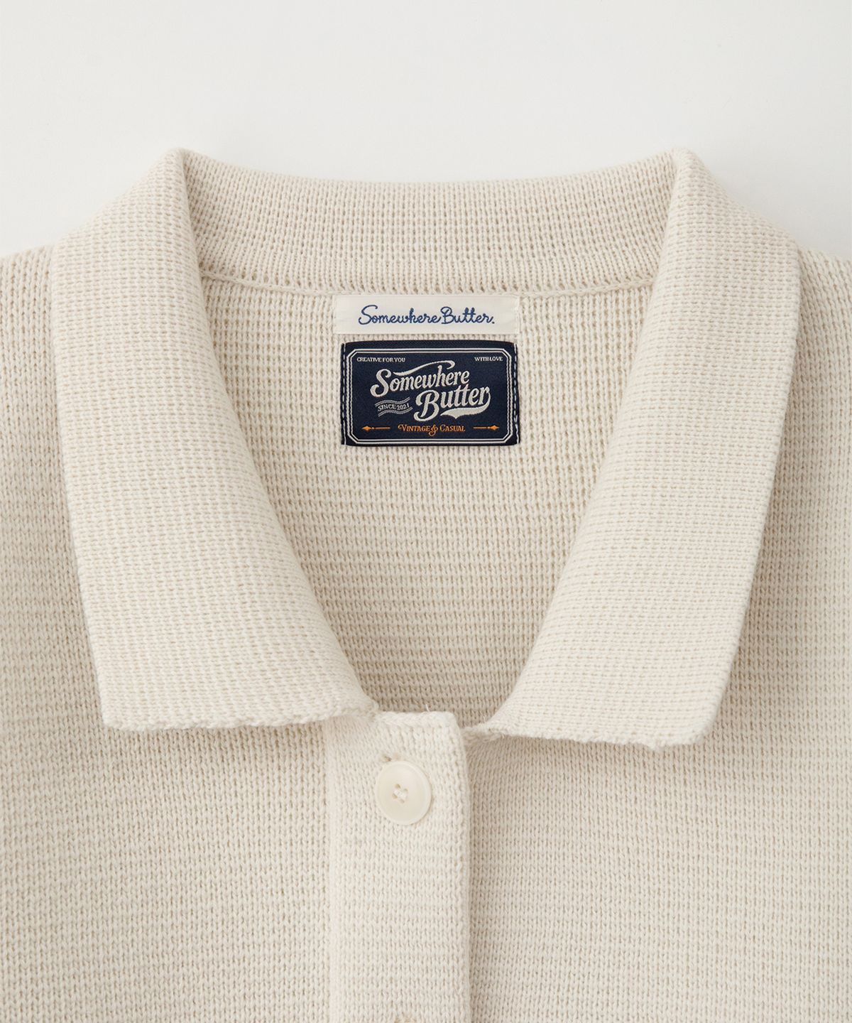 썸웨어버터(SOMEWHEREBUTTER) Stitch Logo Knit Wool Jacket - Ivory