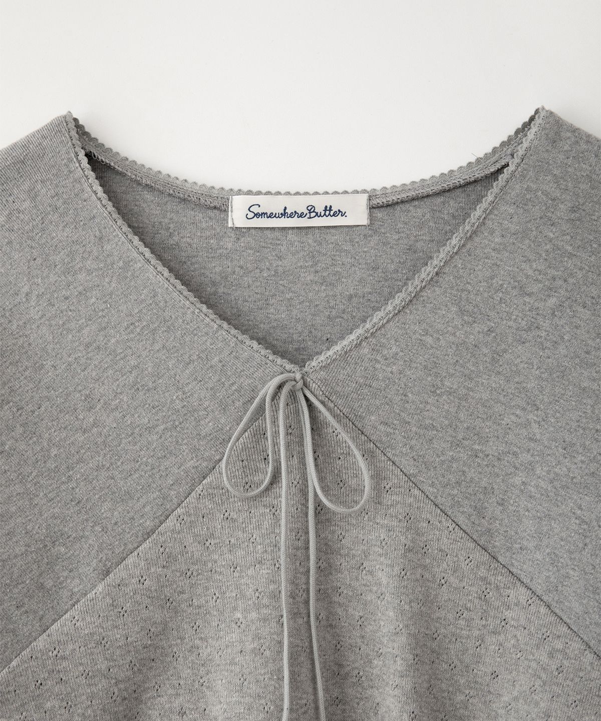 썸웨어버터(SOMEWHEREBUTTER) V-Neck Ribbon Top - Grey