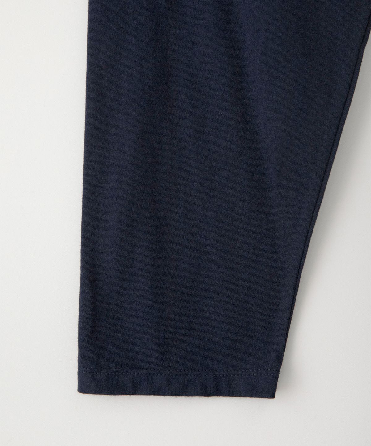 썸웨어버터(SOMEWHEREBUTTER) Wave Logo Raglan Long Top - White Melange(Navy)