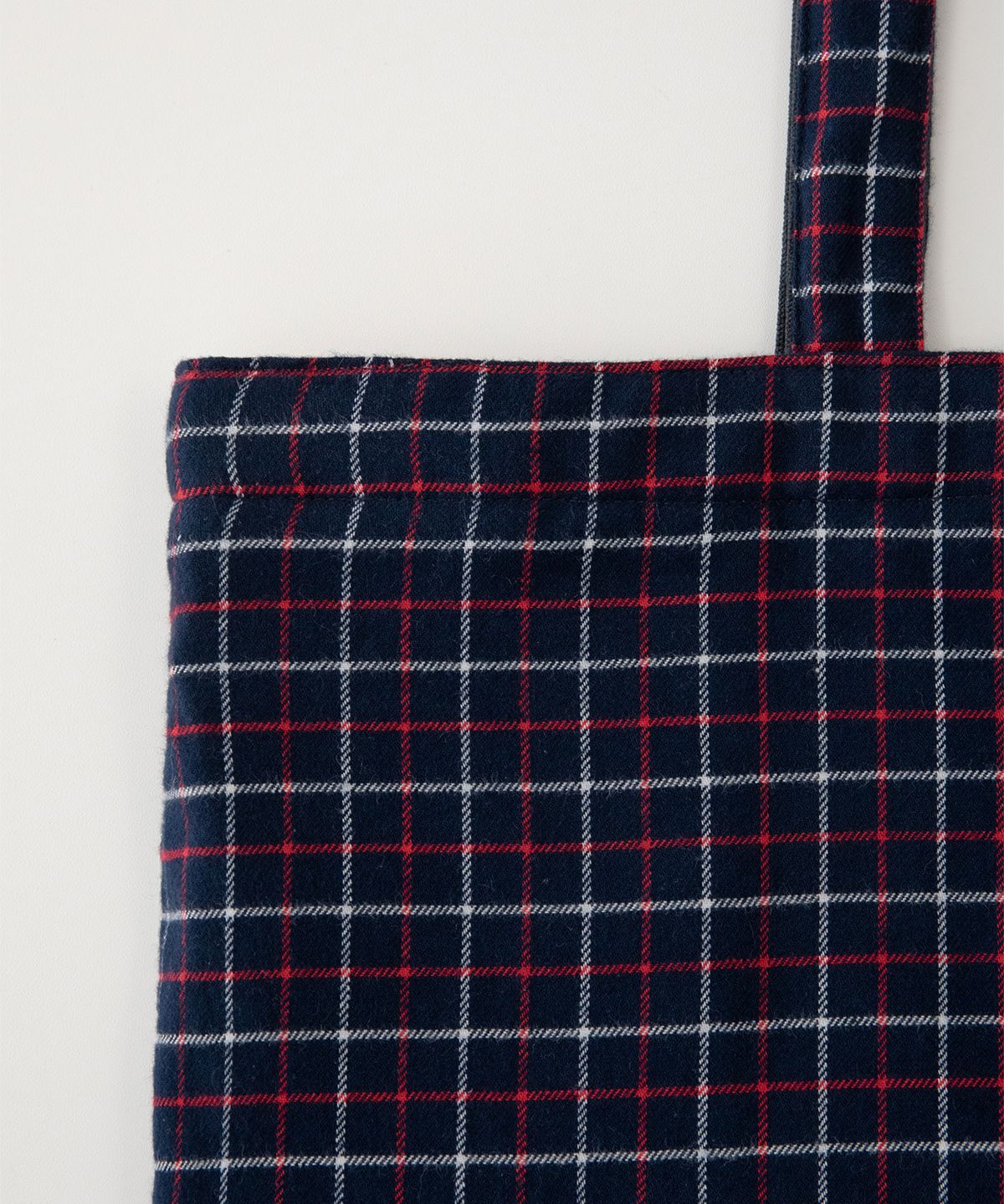썸웨어버터(SOMEWHEREBUTTER) Check Letter Reversible Bag - Ivory(Navy)
