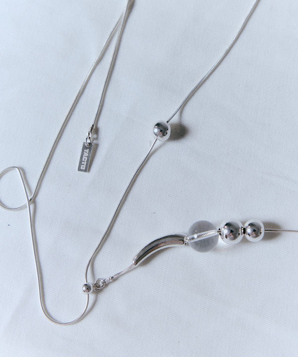탁토(TACTO) 크리스탈 드롭 네크리스 CRYSTAL DROP NECKLACE