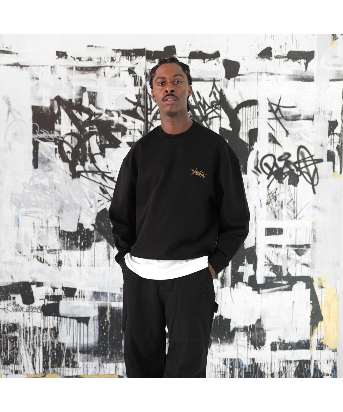 커스텀멜로우(CUSTOMELLOW) [BISCO SMITH] Black Graphic Sweatshirt CWTAW25917BKX