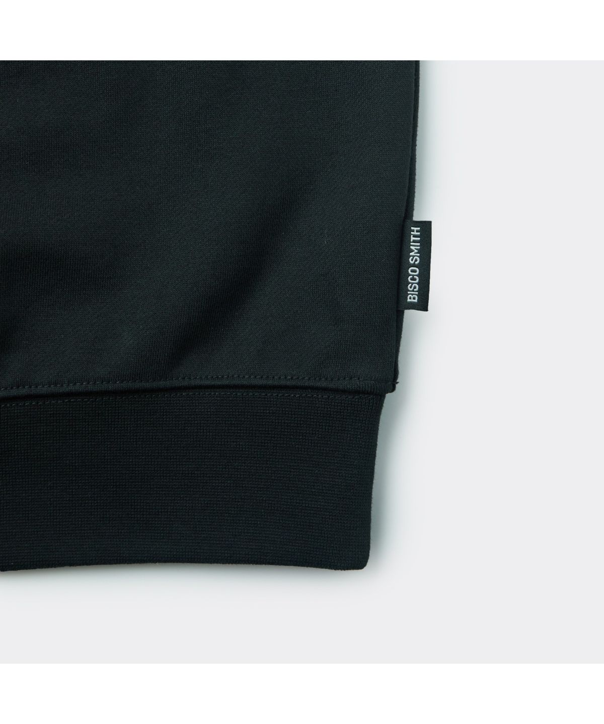 커스텀멜로우(CUSTOMELLOW) [BISCO SMITH] Black Graphic Sweatshirt CWTAW25917BKX