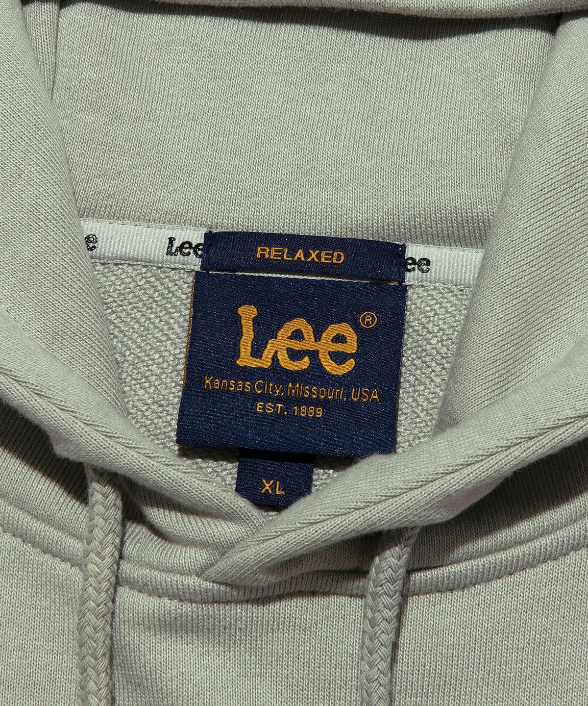 리(LEE) 아치 레터링 그래픽 후드 티셔츠 베이지