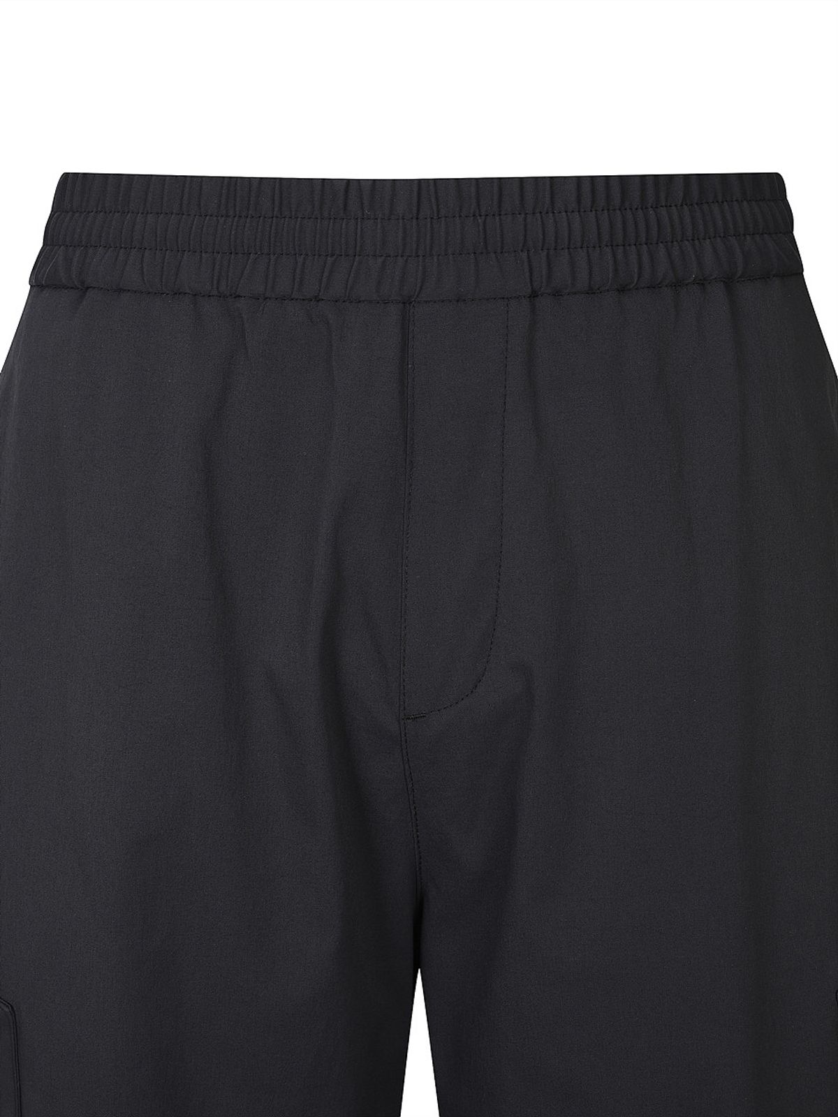 디스커버리 익스페디션(DISCOVERY EXPEDITION) 남성 내추럴 우븐 트레이닝 스트링 팬츠 (BLACK)