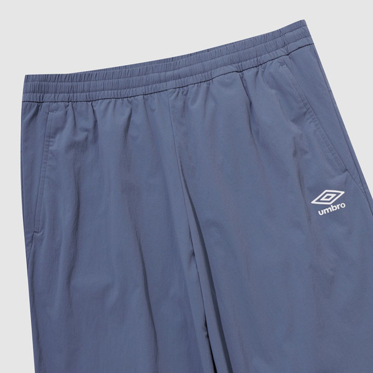 엄브로(UMBRO) 나이트런 베이직 조거 팬츠 블루(UQ321SPT93)