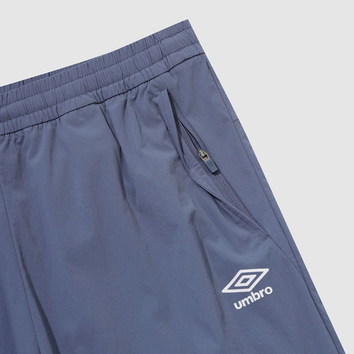 엄브로(UMBRO) 나이트런 베이직 조거 팬츠 블루(UQ321SPT93)