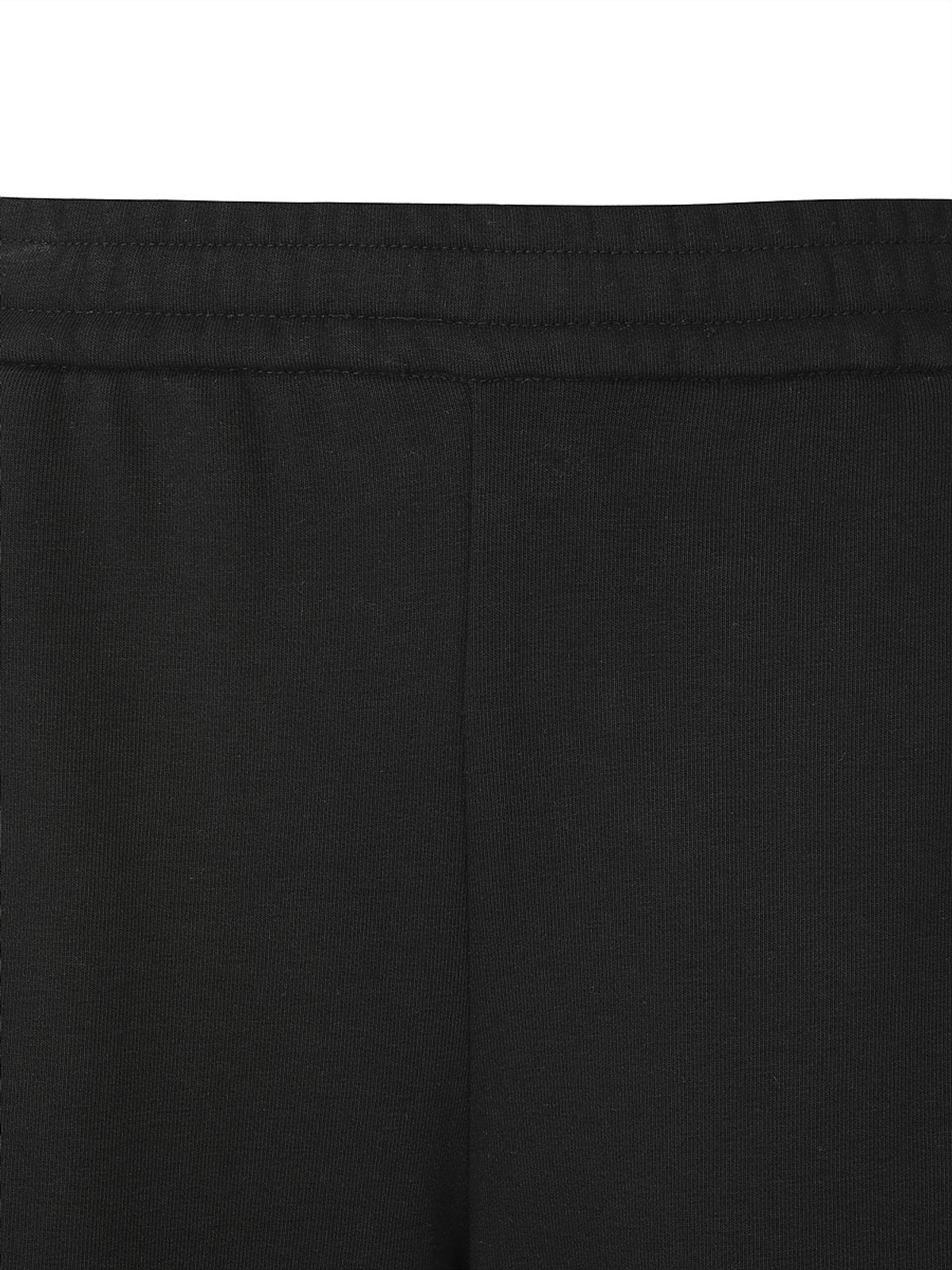 디스커버리 익스페디션(DISCOVERY EXPEDITION) 여성 소로나웜 워싱 트레이닝 세미와이드 팬츠 (BLACK)