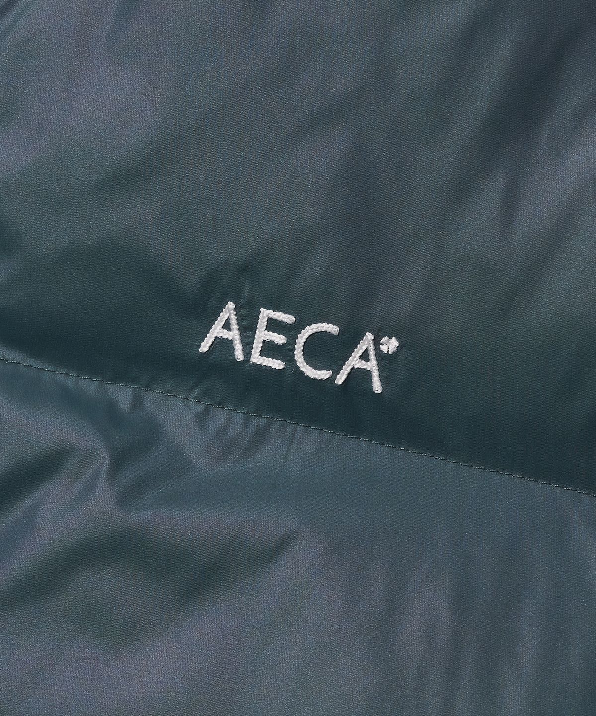 에이카화이트(AECA) AECA CURVED SHORT PUFFER JUMPER-VINTAGE BLUE