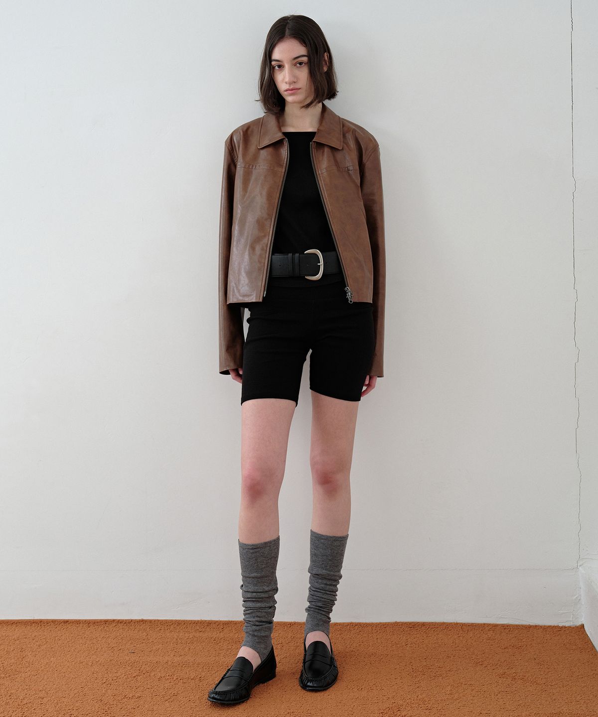 시메트릭 퍼센트(SYMMETRICPERCENT) Minimal Faux-leather Jacket / Brown