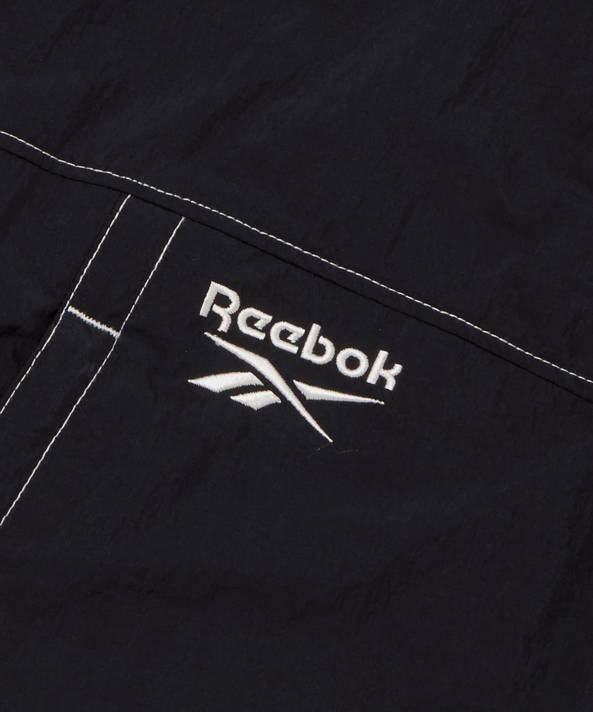 리복(REEBOK) 라이트웨이트 2WAY 윈드 브레이커 - 블랙