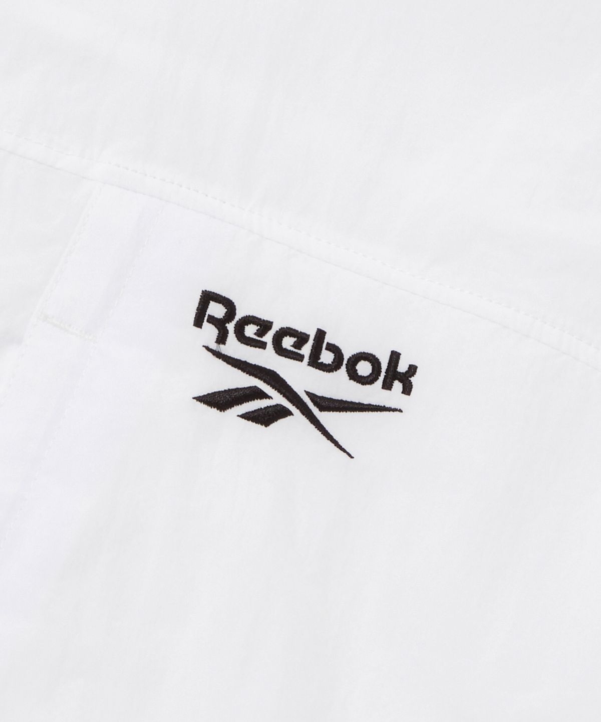 리복(REEBOK) 라이트웨이트 2WAY 윈드 브레이커 - 오프화이트