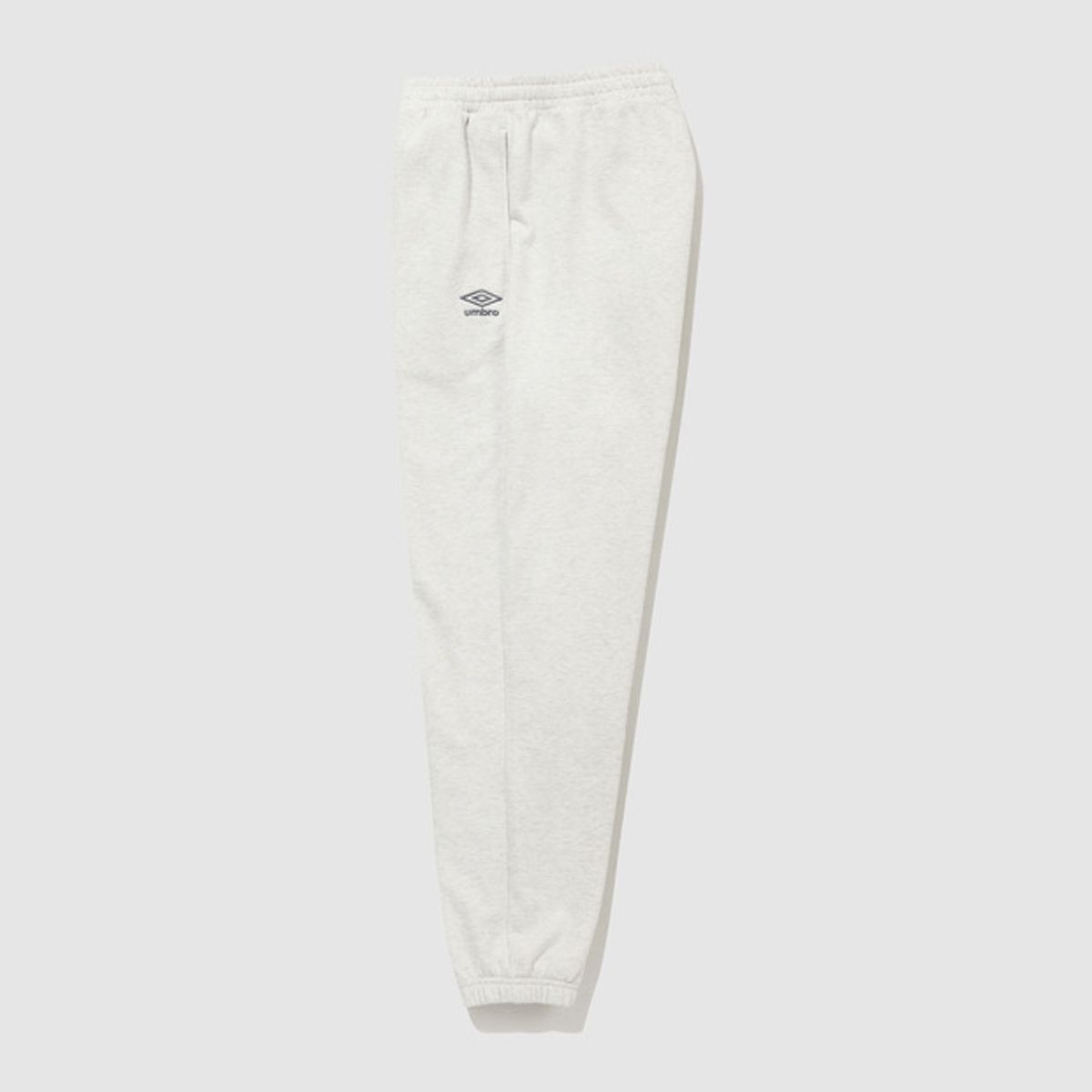 엄브로(UMBRO) 에센셜 루즈 조거 팬츠 아이보리(UQ323CFP93)