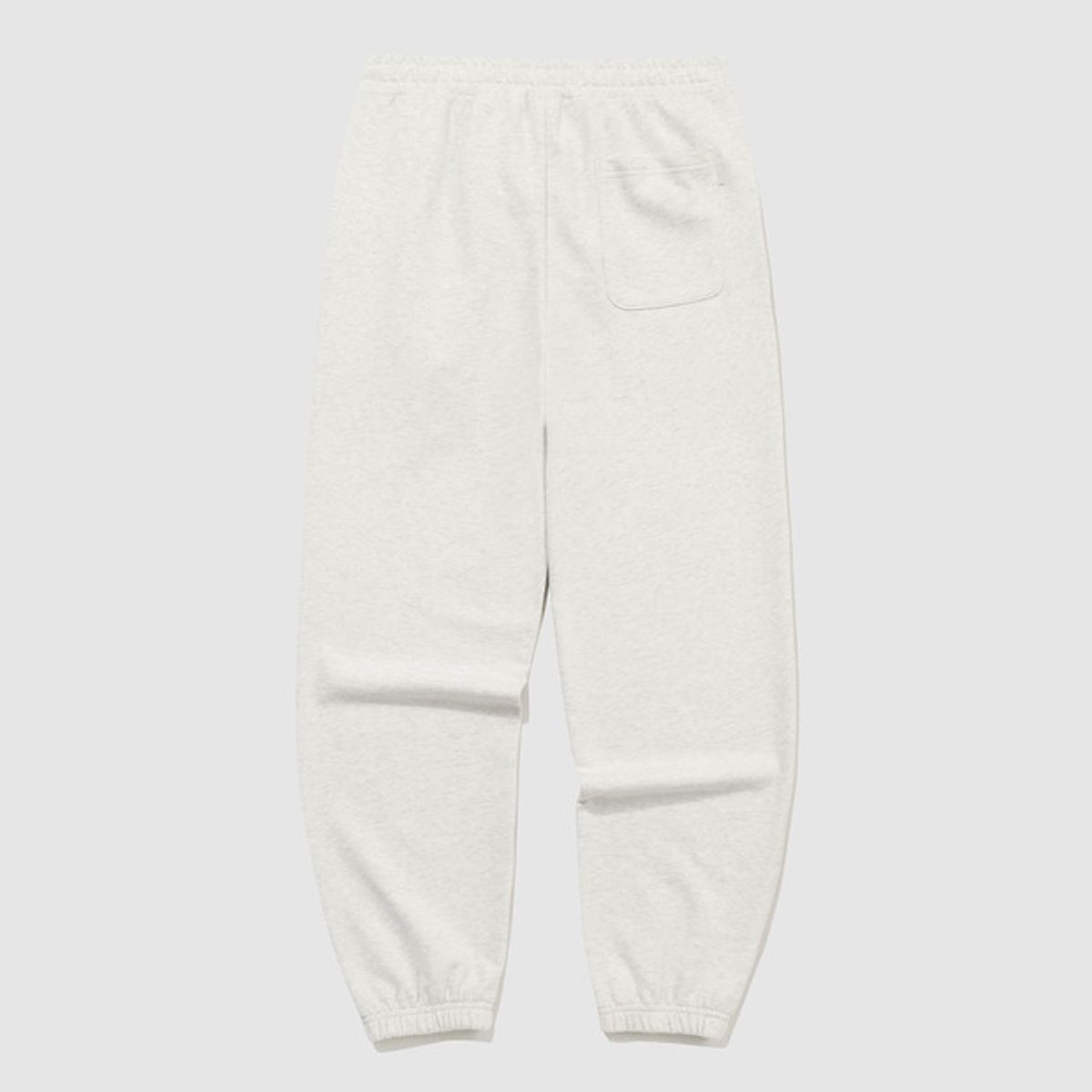 엄브로(UMBRO) 에센셜 루즈 조거 팬츠 아이보리(UQ323CFP93)